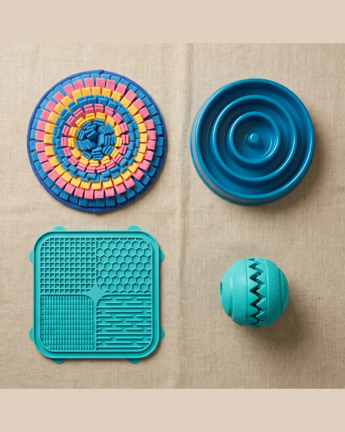 Lick mat, snuffle mat, slow feeder and treat ball from the Pawovi kit